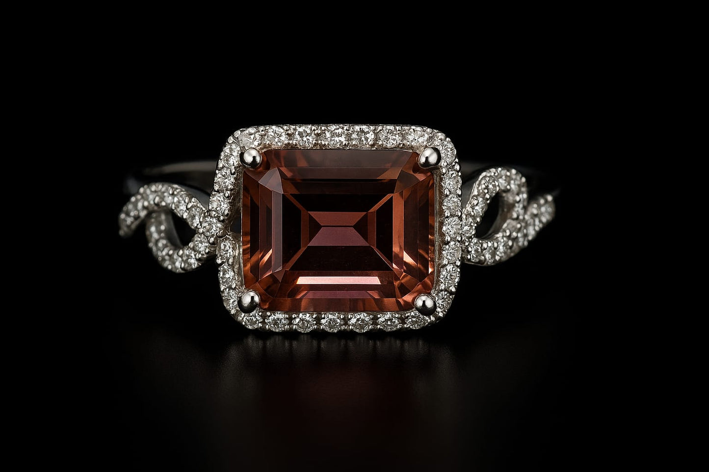 18KT WHITE GOLD ENGAGEMENT RING SET WITH A PINK TOURMALINE AND DIAMONDS