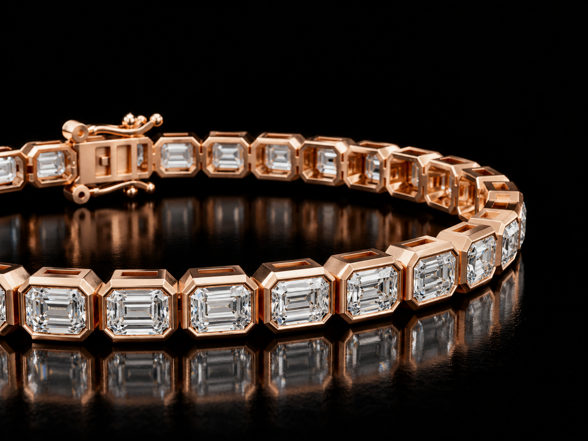 Emerald-cut bezel-set lab-grown diamond tennis bracelet in rose gold, close view