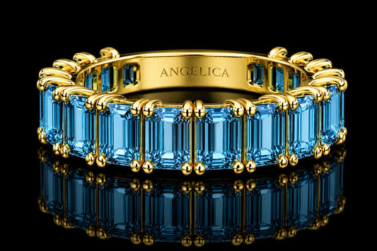 14K Yellow Gold Emerald-Cut Blue Topaz Semi-Eternity Band – 3.83 CT Angelica Jewellers