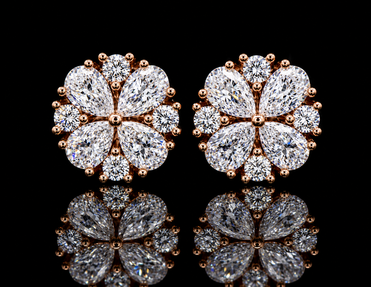 14K ROSE GOLD PEAR SHAPE & ROUND VVS F+ DIAMOND EARRINGS Angelica Jewellers X Waves