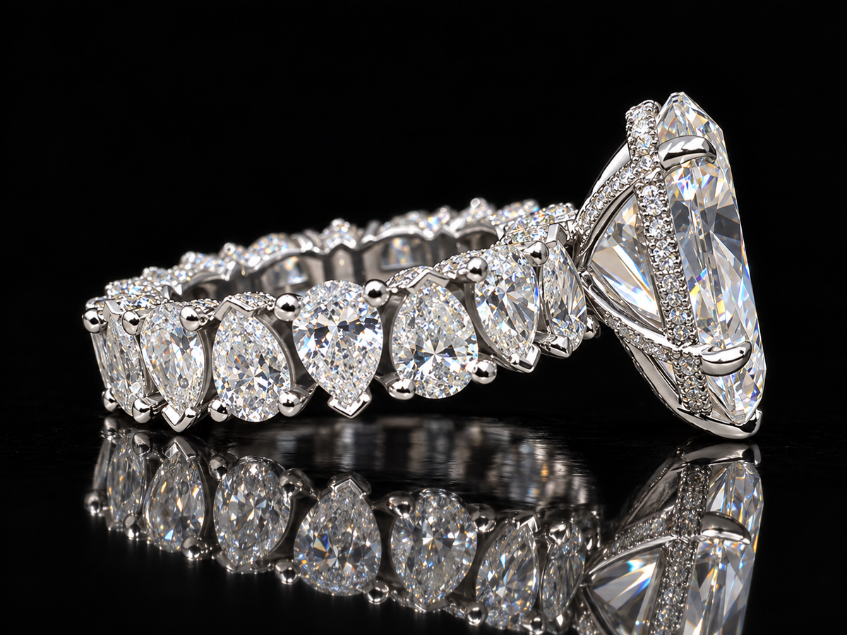 Extravaganza 7.00 Carat Pear-Shaped Diamond Engagement Ring with Eternity-Style Band