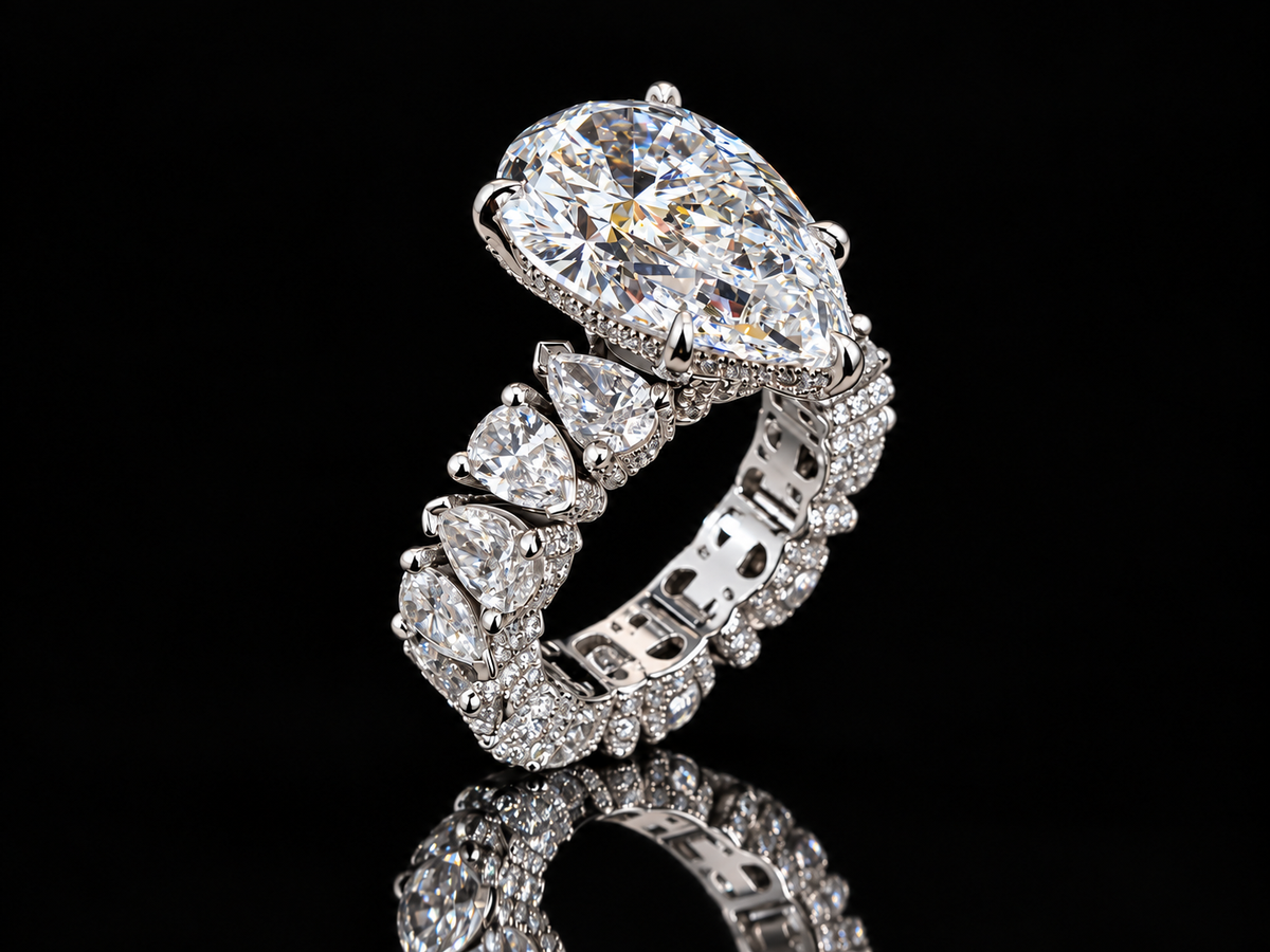 Extravaganza 7.00 Carat Pear-Shaped Diamond Engagement Ring with Eternity-Style Band
