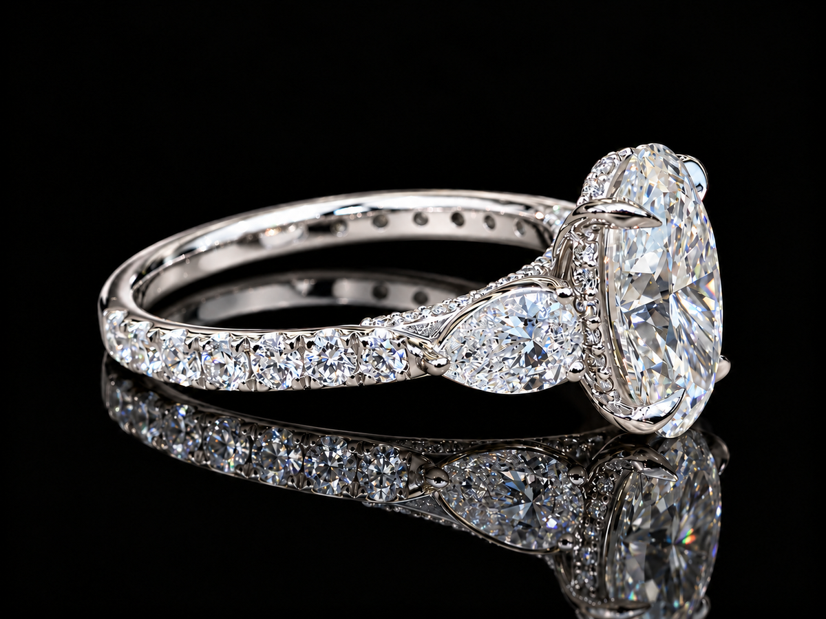 3 CT Oval Lab-Grown Diamond Trilogy Ring with Pavé Side Diamonds