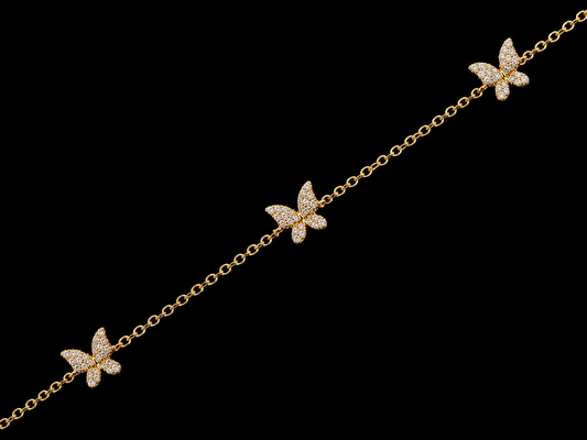 PULSERA DE ORO AMARILLO DE 14 K CON 5 MARIPOSAS Y DIAMANTES 