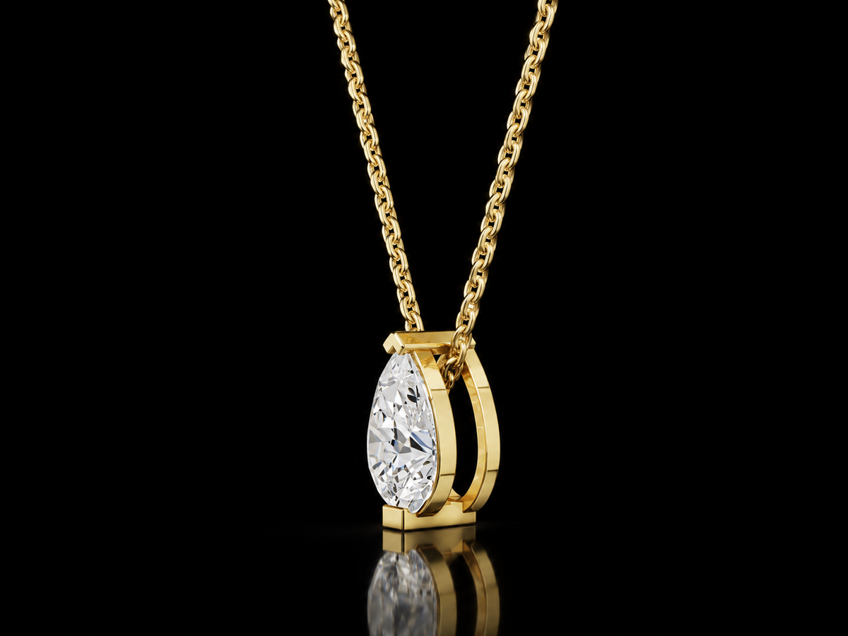 Pear-cut lab-grown diamond solitaire pendant necklace in yellow gold, angled view