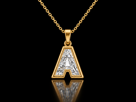 Initial A baguette lab-grown diamond pendant necklace in 14K yellow gold on its cable chain, black background