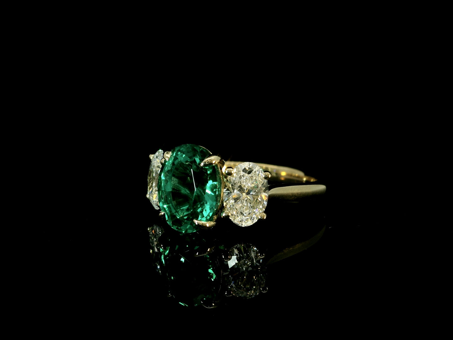 18K YELLOW GOLD LAB GREEN EMERALD EMERALD CUT AND OVAL DIAMONDS RING
